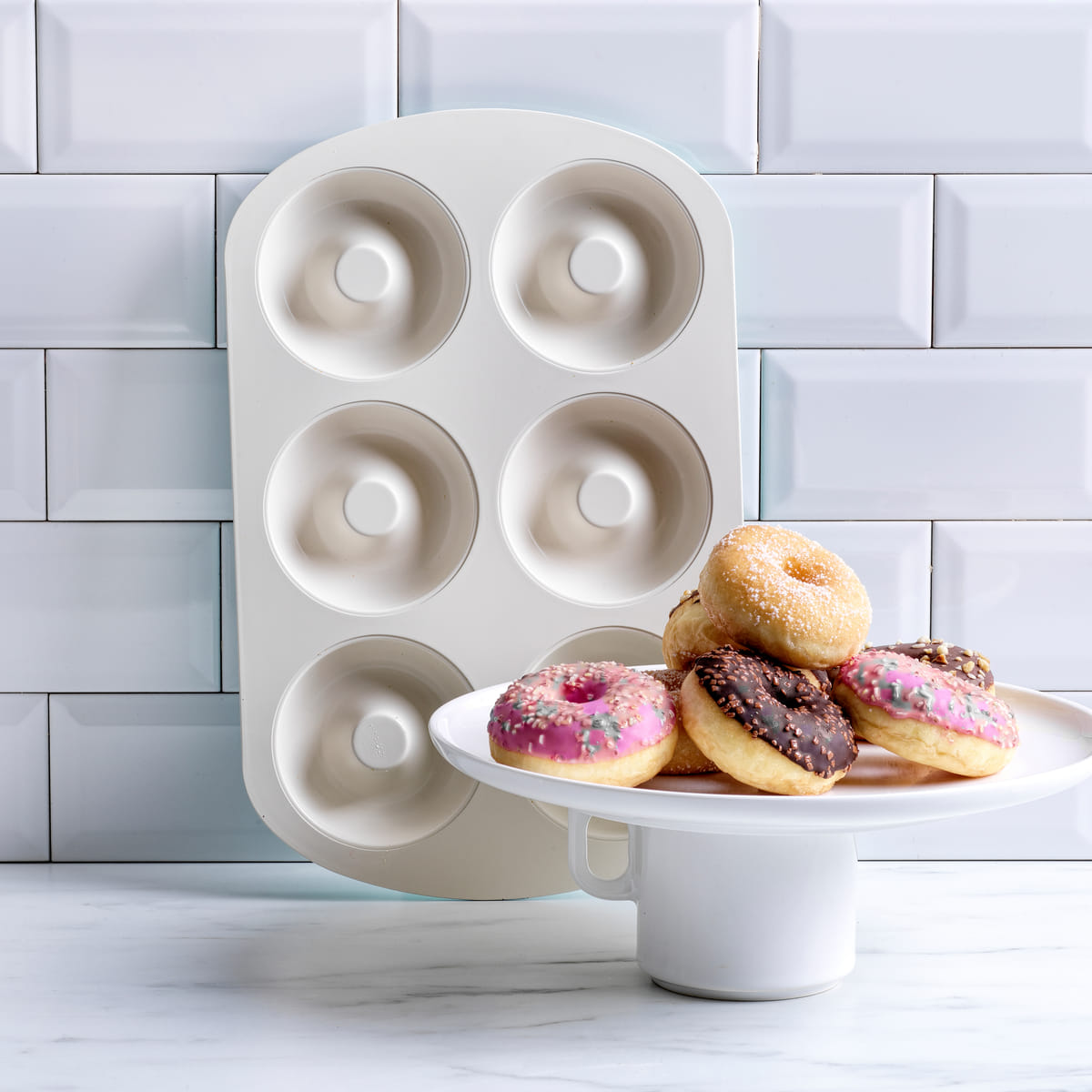 https://greenpan.com.au/cdn/shop/products/CC003906-001-GreenLife-Bakeware-6-cup-Donut-Pan-Turquoise-32-21cm_2.jpg?v=1658471411